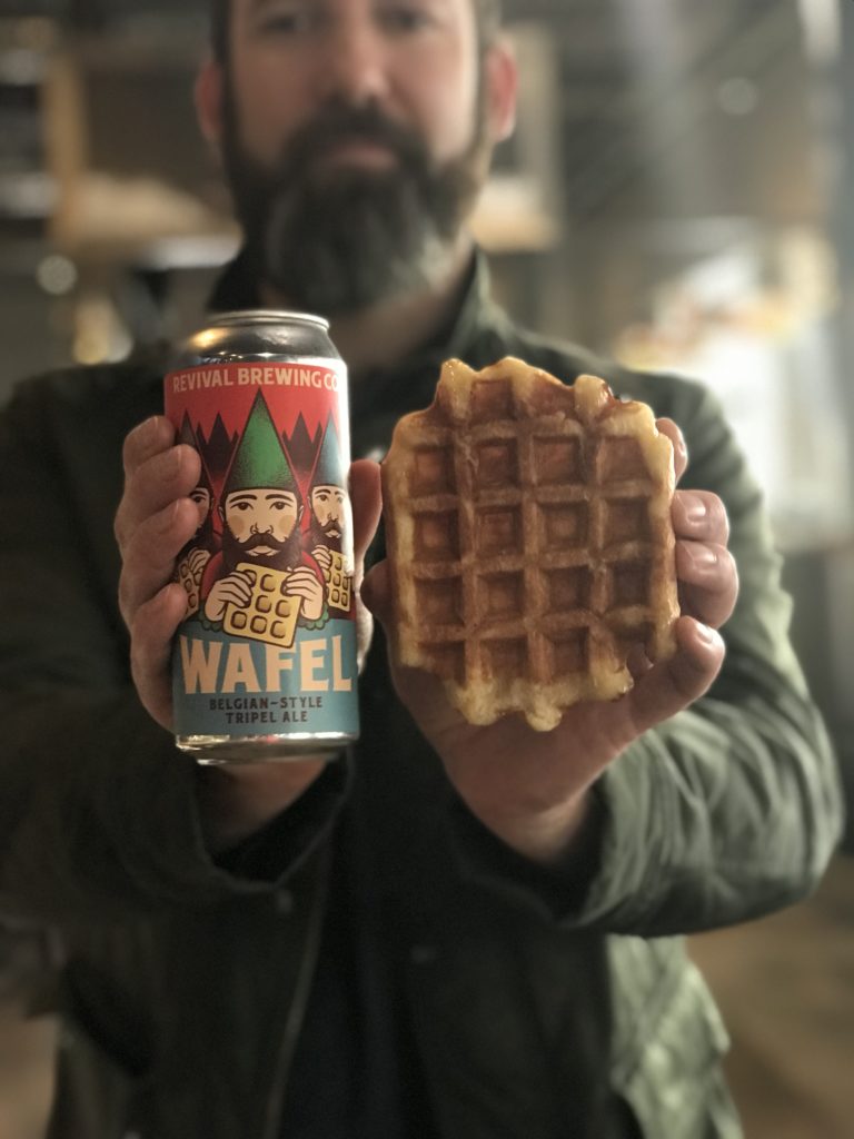Burgundian Coffee & Waffles holds his Belgian-style waffle alongside his Belgian-style Tripel craft beer collaboration with Revival in Cranston.